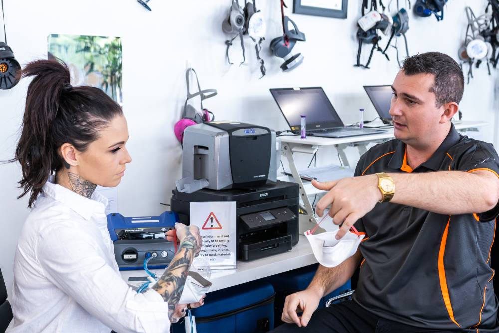 Goran Explaining Fit Test Process to Kara
